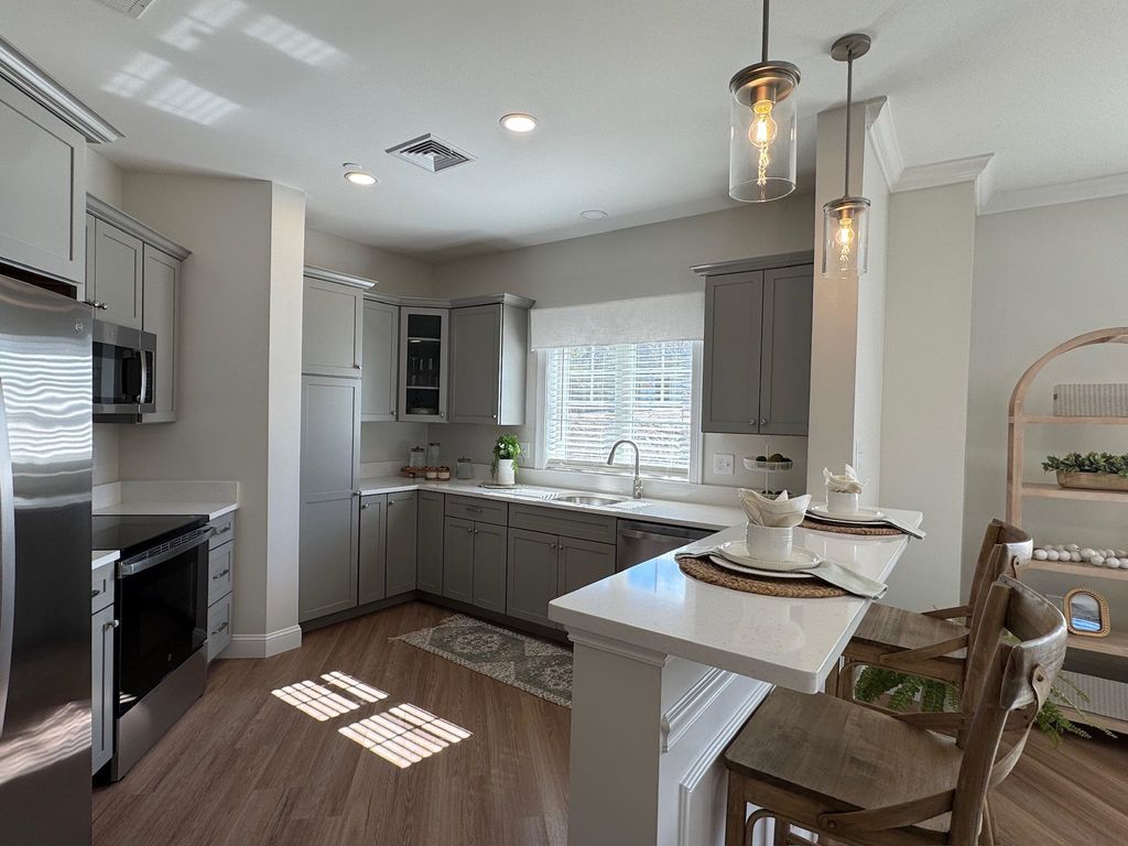 Photo of 74 Rockingham Road #102, Derry, NH 03038 (MLS # 5080615)