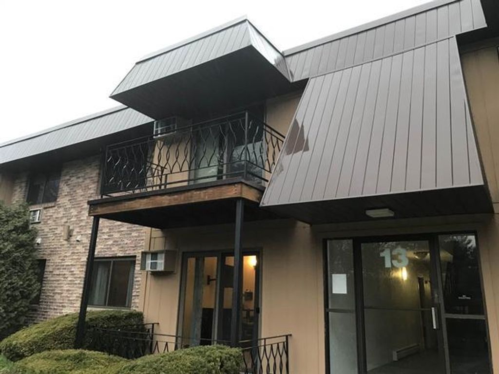 Photo of 13 Strawberry Bank Road #18, Nashua, NH 03062 (MLS # 5083374)