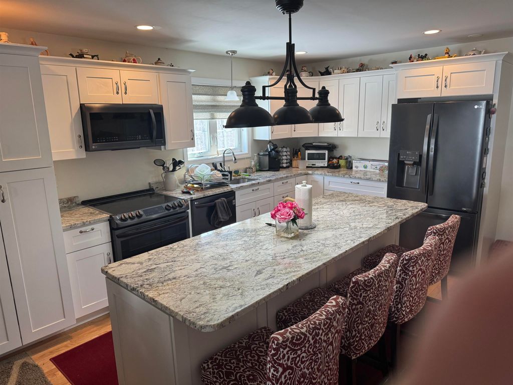 Photo of 113 Memory Lane, Laconia, NH 03246 (MLS # 5078440)