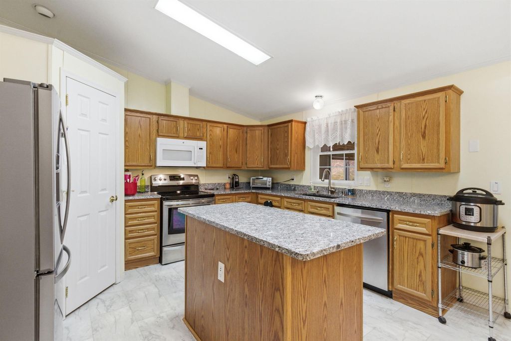 Photo of 407 Darby Drive, Belmont, NH 03220 (MLS # 5083997)