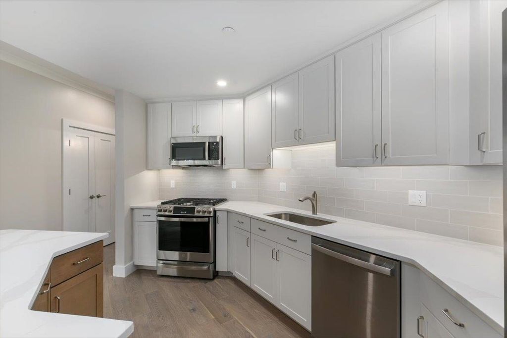 Photo of 65 Pointe Place #104, Dover, NH 03820 (MLS # 5057077)