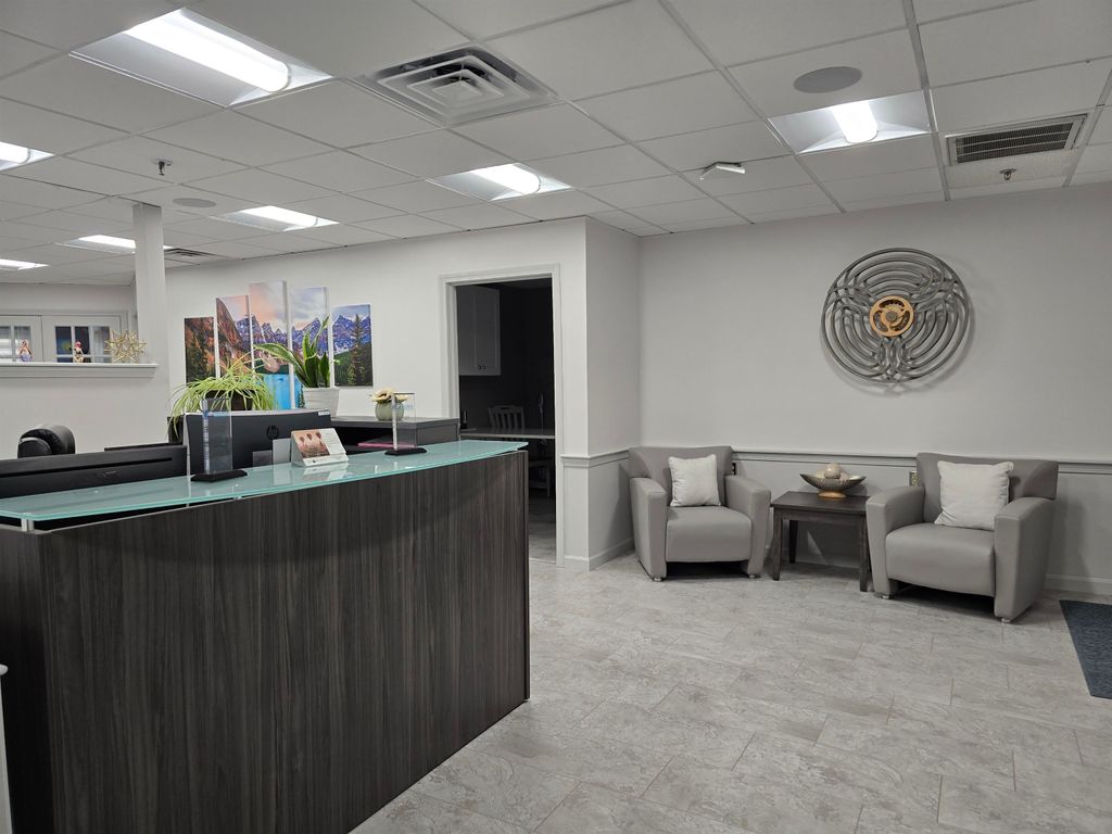 Photo of 276 Newport Road #209/211, New London, NH 03257 (MLS # 5033650)