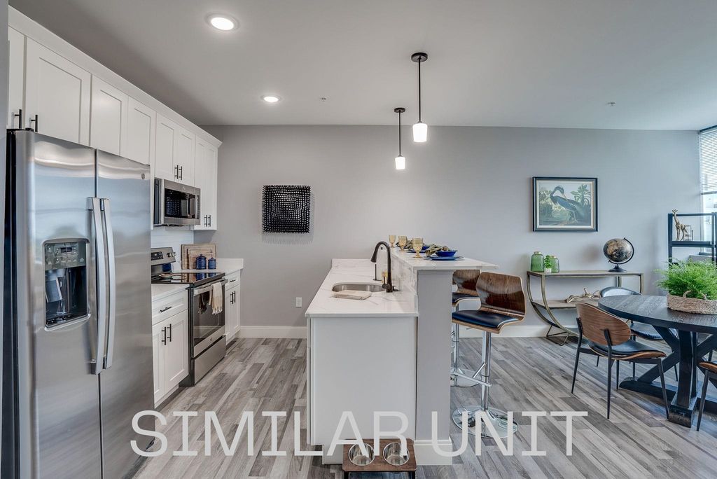 Photo of 1230 Elm Street #411, Manchester, NH 03101 (MLS # 5086447)