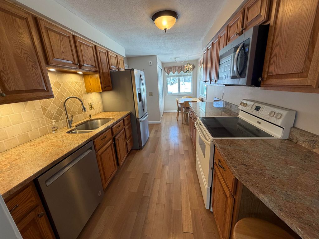 Photo of 79 Walden Pond Drive, Nashua, NH 03064 (MLS # 5077722)