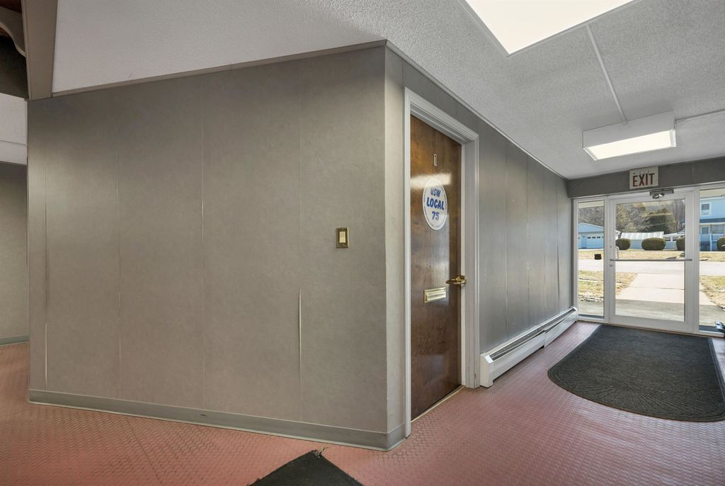 Photo of 55 Maynesboro Street, Berlin, NH 03570 (MLS # 5083071)