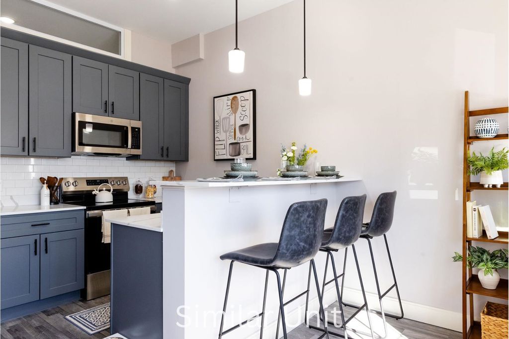 Photo of 1555 Elm Street #102, Manchester, NH 03101 (MLS # 5089318)