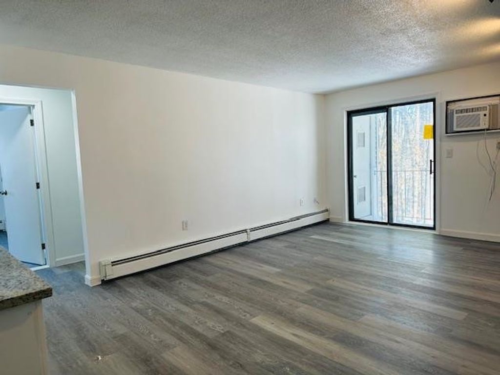 Photo of 3 Knights Bridge Drive #302, Nashua, NH 03063 (MLS # 5076325)