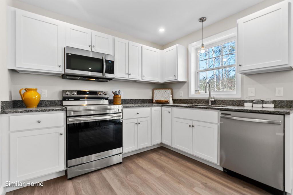 Photo of 8 The Crossings at Village Center, Barrington, NH 03825 (MLS # 5076860)