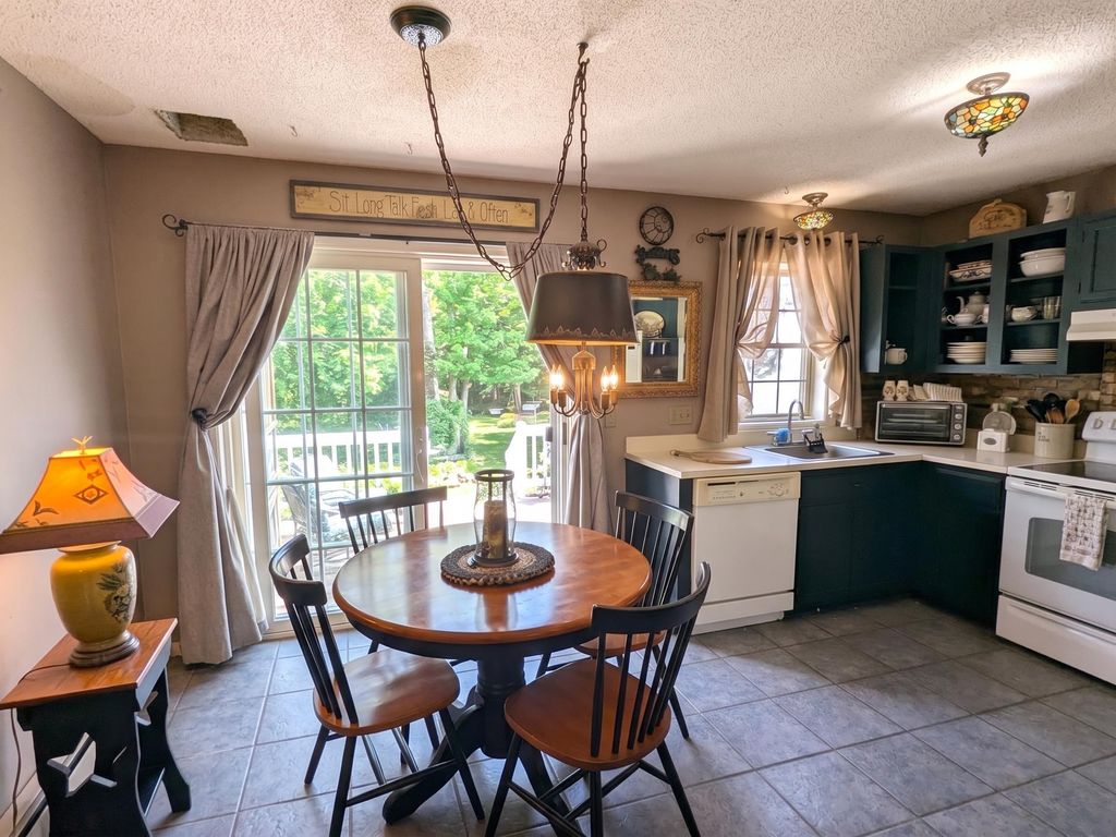 Photo of 61 Woodland Green Grn, Rochester, NH 03868 (MLS # 5085005)