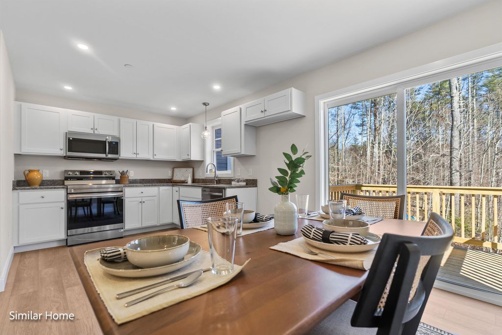 Photo of 14 The Crossings at Village Center, Barrington, NH 03825 (MLS # 5075359)