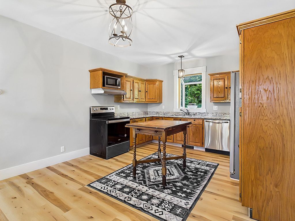 Photo of 30 Spring Street, Colebrook, NH 03576 (MLS # 5058847)