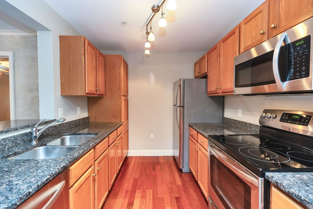 Photo of 265 Edward J Roy Drive #207, Manchester, NH 03104 (MLS # 5070818)