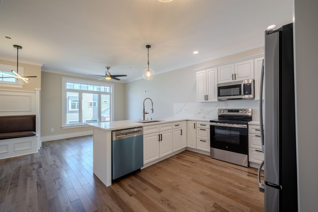 Photo of 103 Riverwalk Way, Manchester, NH 03101 (MLS # 5058637)
