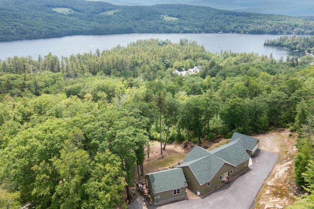 Photo of 11 Sebec Road, Holderness, NH 03245 (MLS # 5049608)