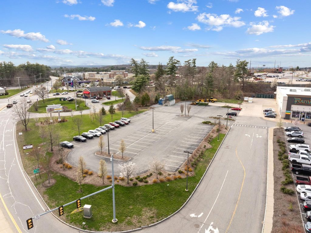 Photo of 707 Huse Road, Manchester, NH 03103 (MLS # 4995455)