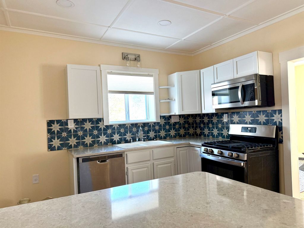 Photo of 12 Wolcott Street, Lancaster, NH 03584 (MLS # 5079401)