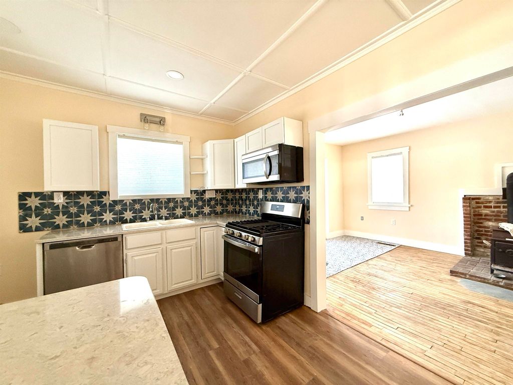 Photo of 12 Wolcott Street, Lancaster, NH 03584 (MLS # 5079401)