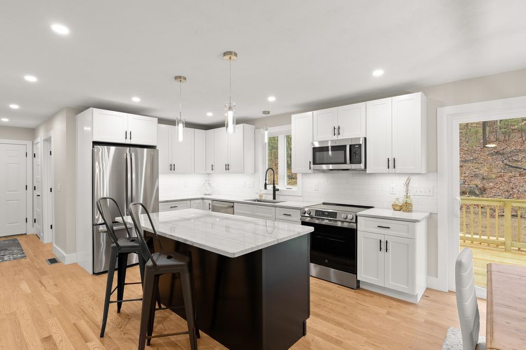 Photo of 12 Peaslee Road, Rochester, NH 03867 (MLS # 5074642)