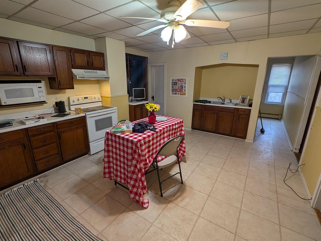 Photo of 457 Hillsboro Street, Berlin, NH 03570 (MLS # 5086279)