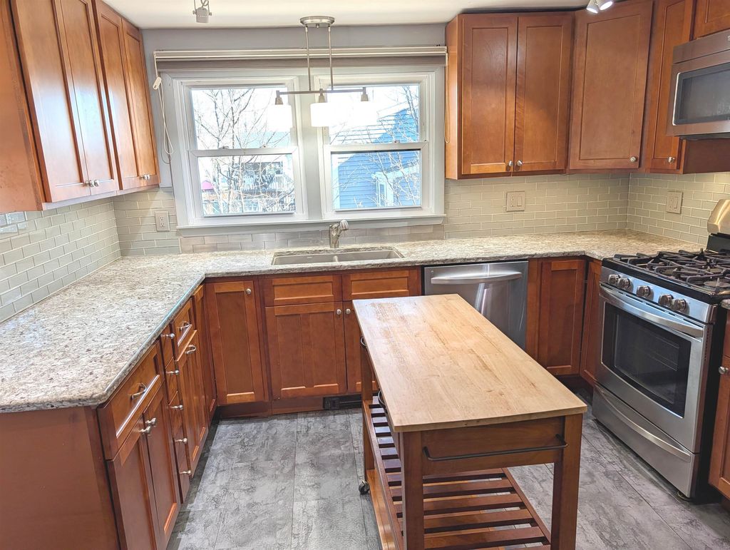 Photo of 12 Fernand Street, Manchester, NH 03103 (MLS # 5082849)