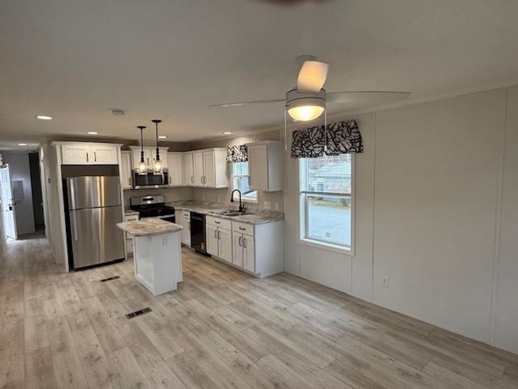 Photo of 10 Courtesy Avenue, Belmont, NH 03220 (MLS # 5070661)