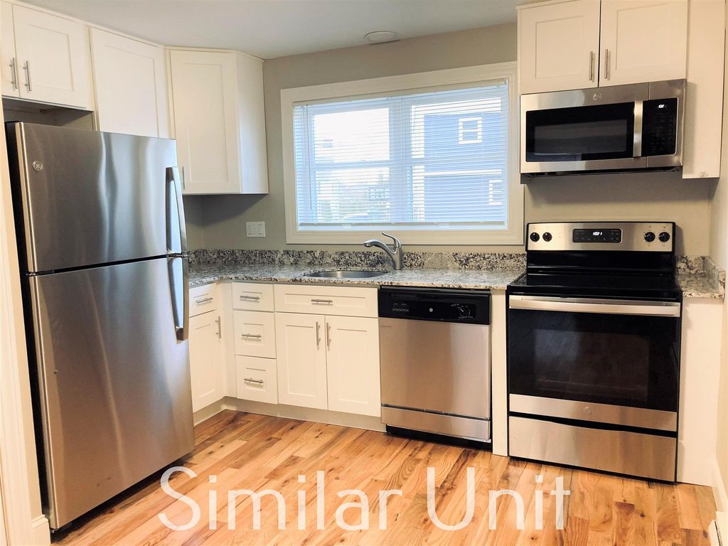 Photo of 357 Kennard Road #357-3B, Manchester, NH 03104 (MLS # 5058606)