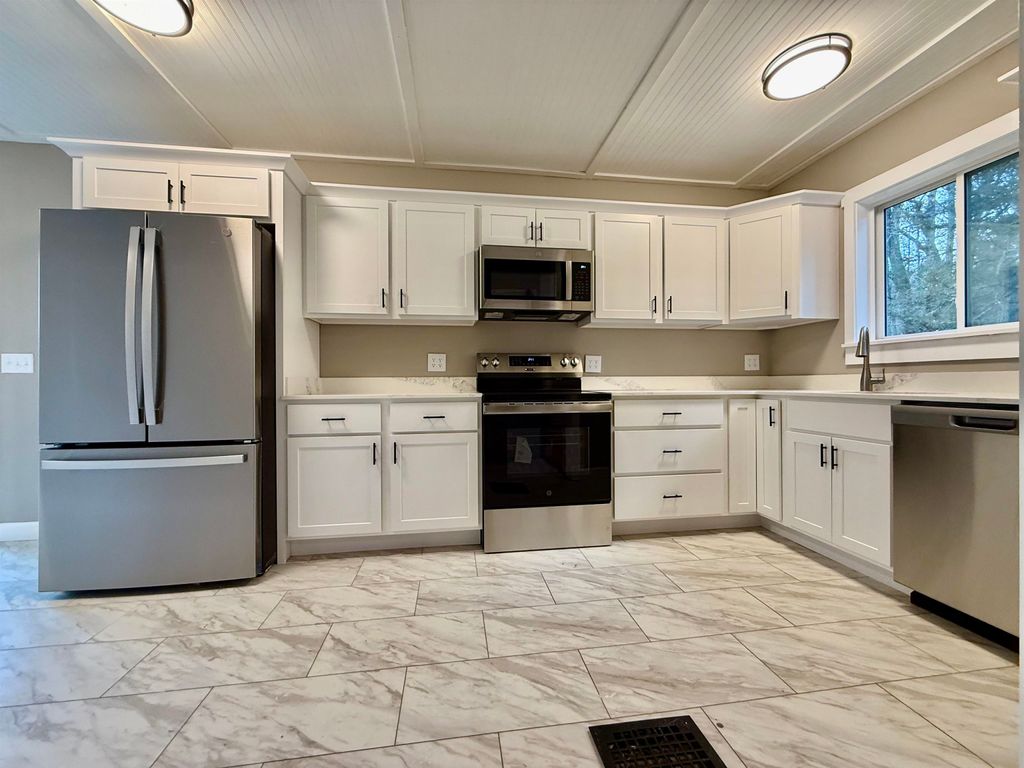 Photo of 28 Leach Avenue, Franklin, NH 03235 (MLS # 5069426)