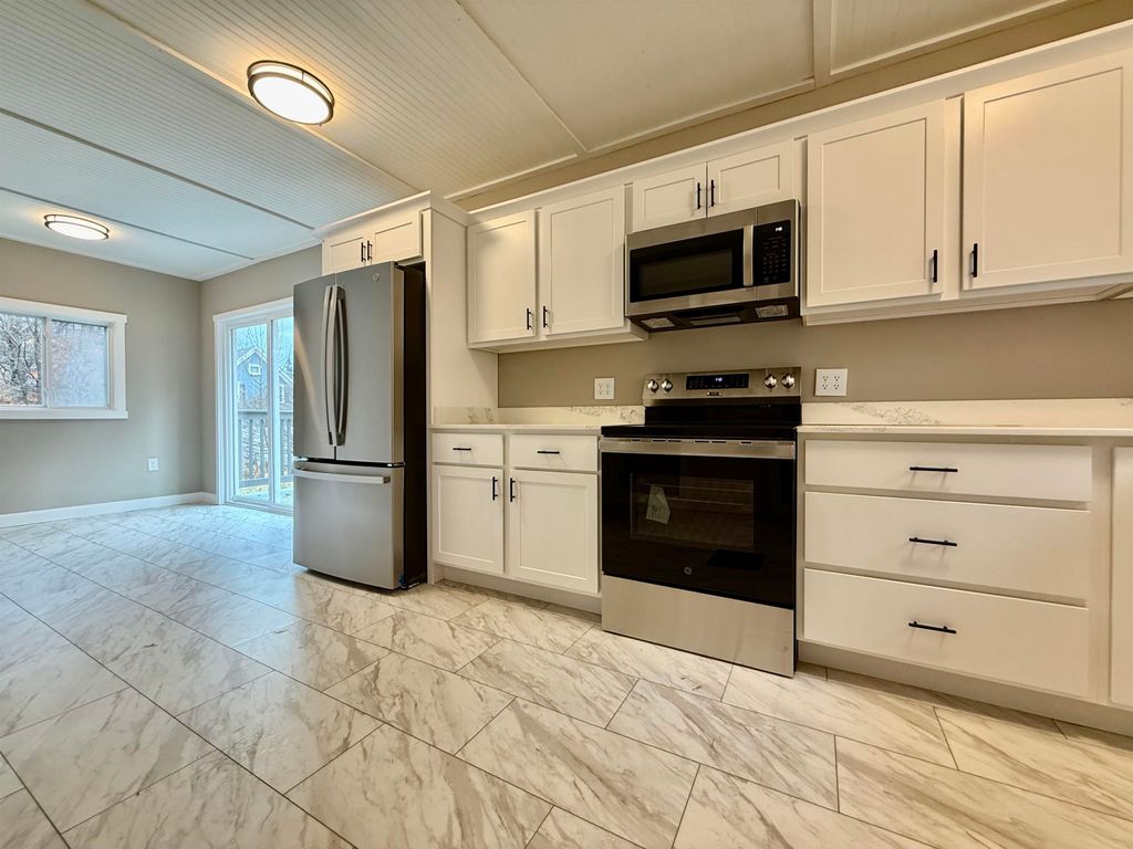 Photo of 28 Leach Avenue, Franklin, NH 03235 (MLS # 5069426)