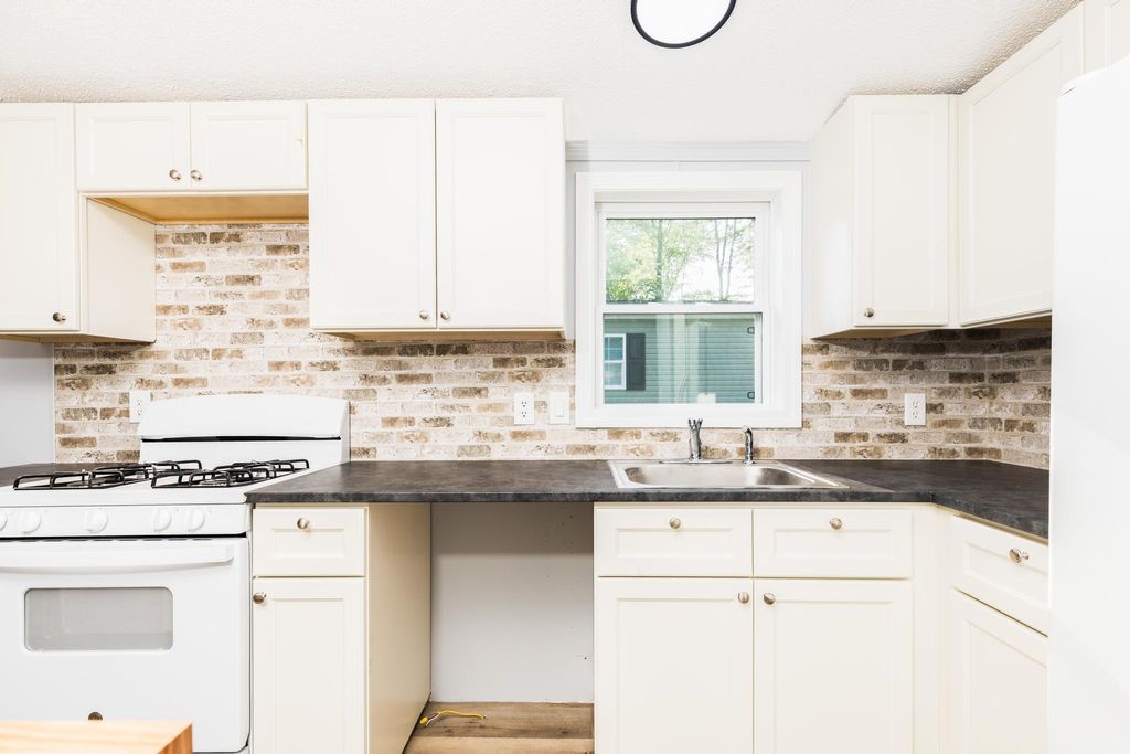 Photo of 311 Friar Tuck Drive, Exeter, NH 03833 (MLS # 5054704)
