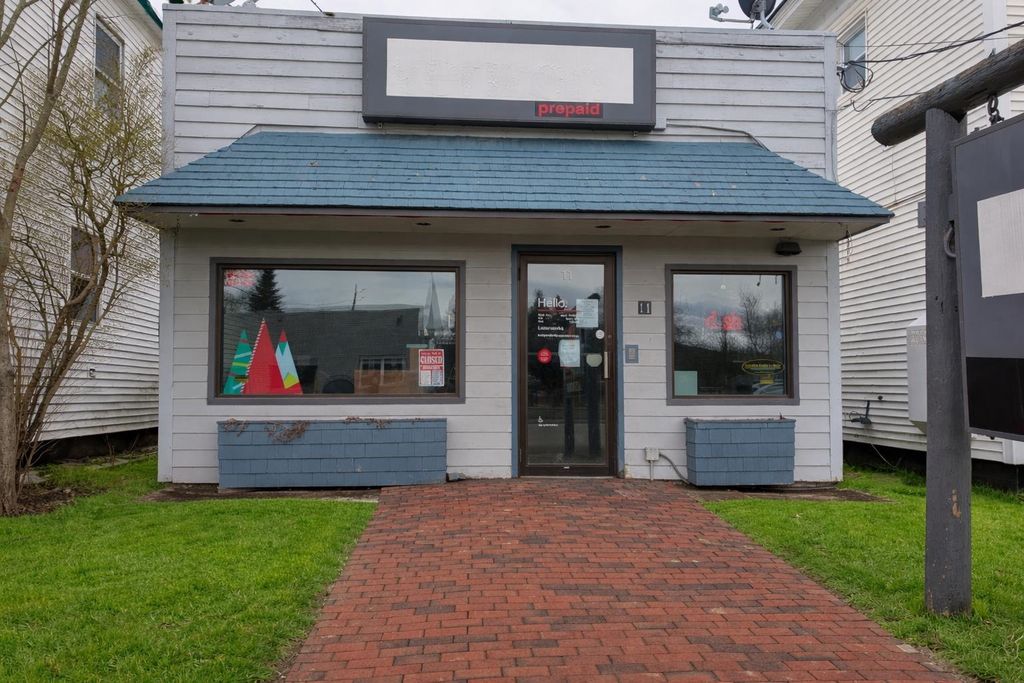 Photo of 11 Bridge Street, Colebrook, NH 03576 (MLS # 5078466)