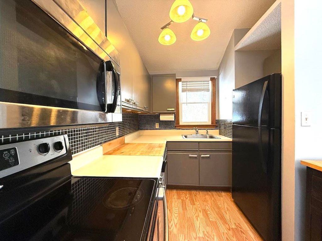 Photo of 21 Plaza Village Road #D, Plymouth, NH 03264 (MLS # 5077713)