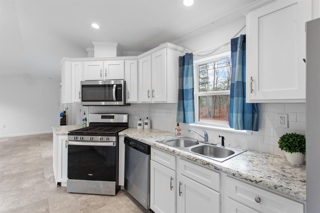 Photo of 52 Little Falls Bridge Road, Rochester, NH 03867 (MLS # 5069545)