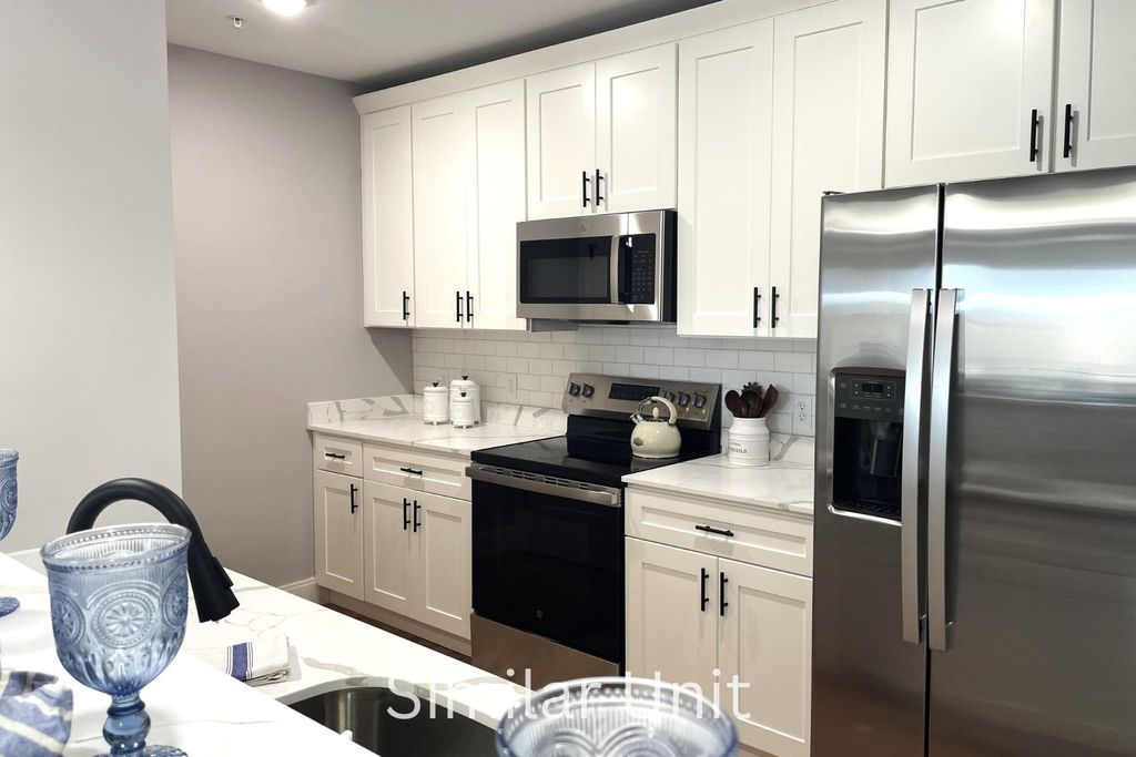 Photo of 303 Dunbar Street #418, Manchester, NH 03103 (MLS # 5071490)