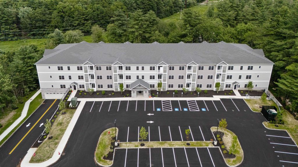 Photo of 10100 S Willow Street #214, Manchester, NH 03103 (MLS # 5064612)