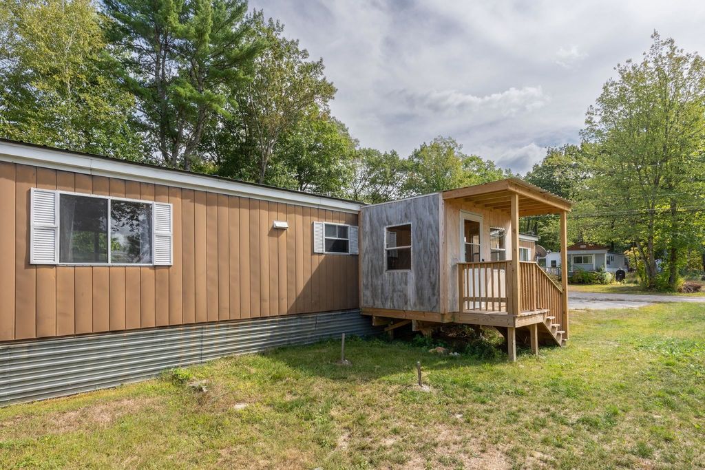 Photo of 42 Woodhill Village, Henniker, NH 03242 (MLS # 5061789)