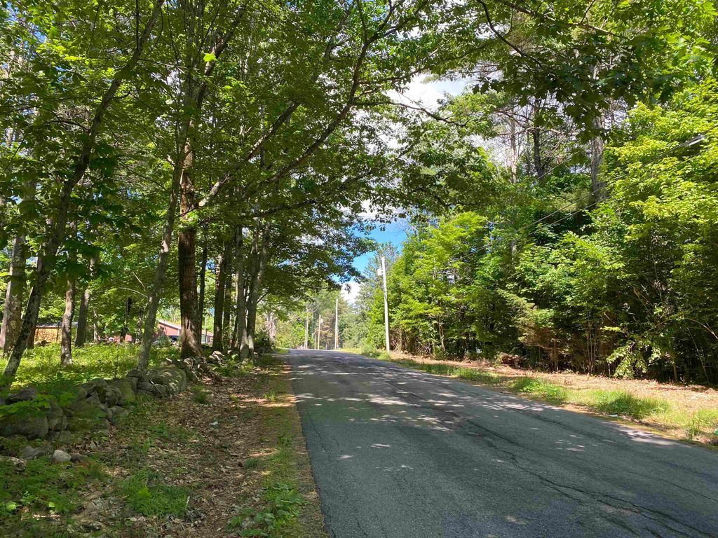 Photo of 18 Catamount Road, Pittsfield, NH 03263 (MLS # 5076220)