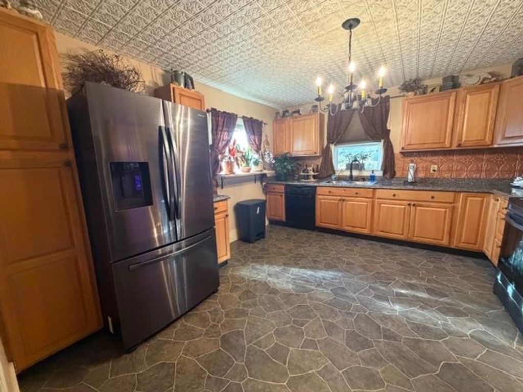 Photo of 266 Madison Avenue, Berlin, NH 03570 (MLS # 5063531)