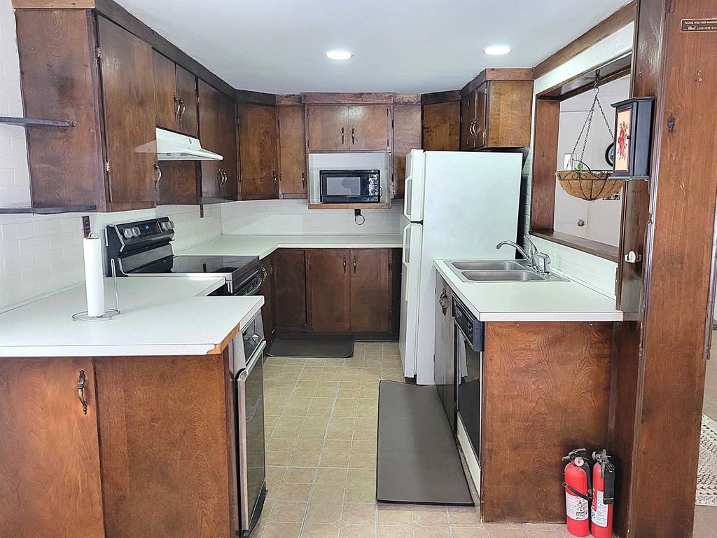 Photo of 108 W Village Road, Milan, NH 03588 (MLS # 5077497)