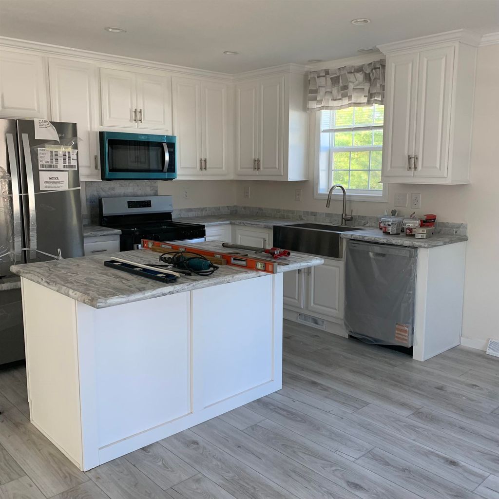 Photo of 52 RIVERVIEW Drive, Rochester, NH 03867 (MLS # 5063928)