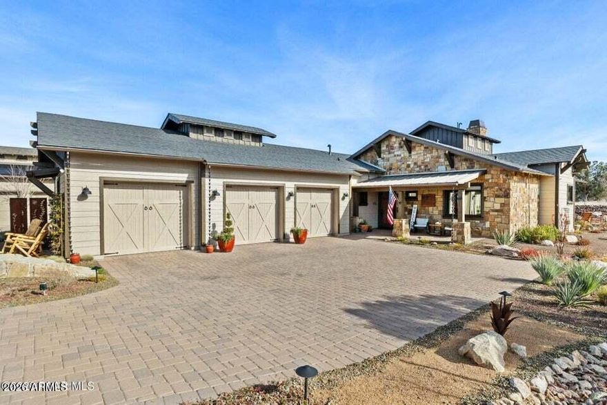 Highly upgraded home at end of quiet cul-de-sac with stunning views. 2 bed + den, 3 bath featuring wood-look tile, quartz counters, custom cabinetry. Kitchen offers large island, farmhouse sink, dual ovens (gas & electric), 36'' GE Café 6-burner gas range, stainless hood, pot filler, RO system, KitchenAid appliances. Living room includes gas fireplace, beamed ceilings, surround sound, powered window treatments. Baths with glass showers. Comforts include forced air HVAC, Quiet Cool whole-house fan, humidifier, water softener, ceiling fans. Exterior fully landscaped with drip irrigation, gas fire pit, and new paint Oct 2025. 3-car garage w/ epoxy floors, custom cabinets, slat walls, workbench, utility sink, storage. Rare lot backing HOA land. Located in Talking Rock gated Private Club.