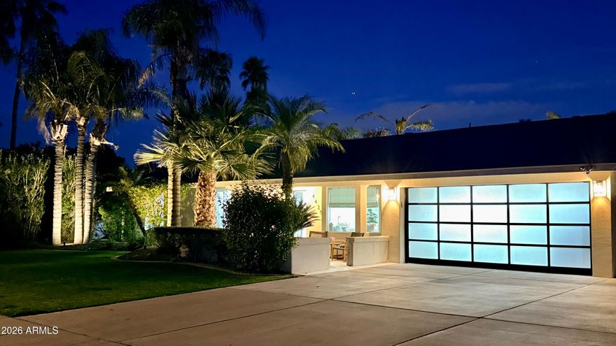 Absolutely Stunning Home minutes from Paradise Valley Mall. This is a rare opportunity to own a newly built home that is the perfect combination of Luxury meets Resort Living.  From the time you walk in with the Monogram Appliance Suite, Induction Stove, and GORGEOUS custom Marble touches throughout the entire home. The Spacious split floor plan includes 3 high class bathrooms, and 4 bedrooms of which there are 2 primary suites.  Did I mention the closets?  You have your own private steamer for your clothes in one of them. Not only do you have a comfy front courtyard, but the impressive backyard has a wooden pergola with misters, outdoor kitchen, heated pool, putting green, garden, and more.  This home is the kind of home that you will wish you had looked at...so do not miss out!!!