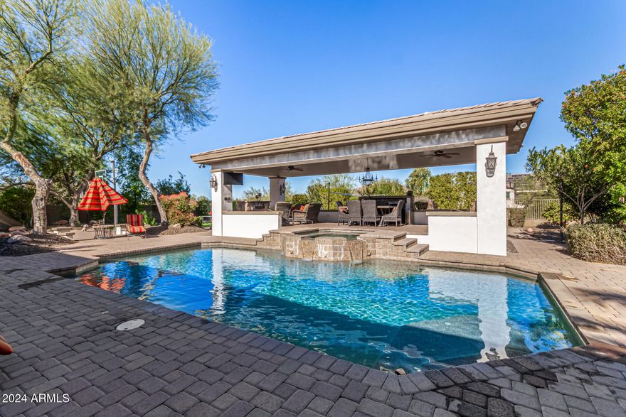 This amazing property is located in the highly sought after neighborhood of Cibola Vista!   Nestled in a private planned community with awesome mountain views, walking trails, greenbelts, beautiful mature landscaping with no through streets. This property boasts the most desirable exposure with a North facing backyard with view fencing, play pool and an elevated Ramada!  Outdoor entertaining at its best with two outdoor fireplaces, 2 bar refrigerators and a BBQ island.  Curb appeal begins at the front yard with the extended driveway and an additional paver driveway on the side at the RV gate.  Enter through the gated courtyard into the front door.  You will be greeted with amazing mountain views!   Five full bedrooms and 3.5 bathrooms.  So many options with this floor plan! Options include using the formal dining area as an office and using the formal living area as a game room. A full-size pool table fits perfectly!  Many recent solds have completely remodeled the interiors.  Some have even added casitas and RV garages.  This neighborhood holds its value!  Located across the street from acre lots with three to six million-dollar homes. Just show and sell with Ramada and pool with spa sport court this home is a great family home and great schools nearby with new restaurant's everywhere and shopping too this is a great home. Home will only be available for another 30 days and will be turned into rental this is a great opportunity to get great home with over 21,000 sq ft lot and over 275k in back yard front courtyard and additional paver drive way. You will not find a better north facing backyard all homes are grand in subdivision. Must see to appreciate.