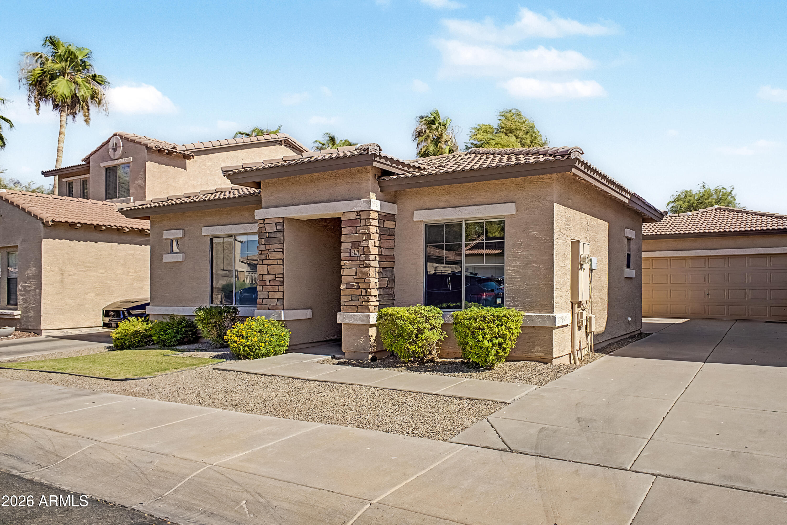 5207 W PARADISE Drive