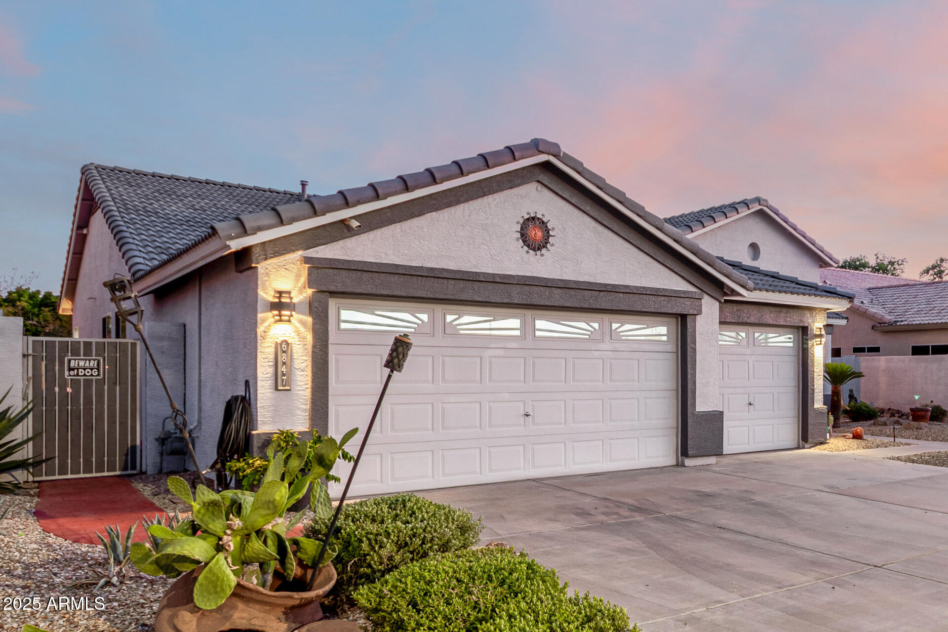 6847 W EL CORTEZ Place