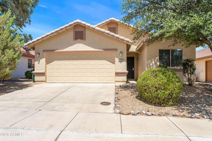 Welcome to this beautiful home located in the desirable Holiday community of Sierra Vista, AZ. This spacious 4-bedroom, 2-bathroom residence features a split floor plan, offering added privacy with the primary suite thoughtfully separated from the additional bedrooms. Vaulted ceilings and ceiling fans enhance the open, airy feel, while durable tile flooring adds style and easy maintenance to the main living areas. The kitchen is well-equipped with a refrigerator, electric range, and built-in microwave, making it both functional and convenient for everyday living. The primary suite provides a comfortable retreat with a dual-sink vanity, relaxing garden tub, and separate walk-in shower. As part of the Holiday community, residents also enjoy access to a pool, spa, clubhouse and playground.