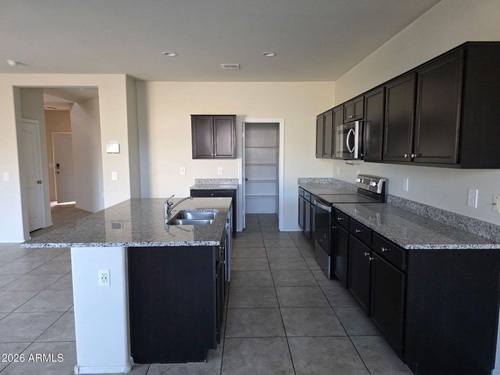 Photo of 35262 W San Ildefanso Avenue, Maricopa, AZ 85138 (MLS # 7005304)