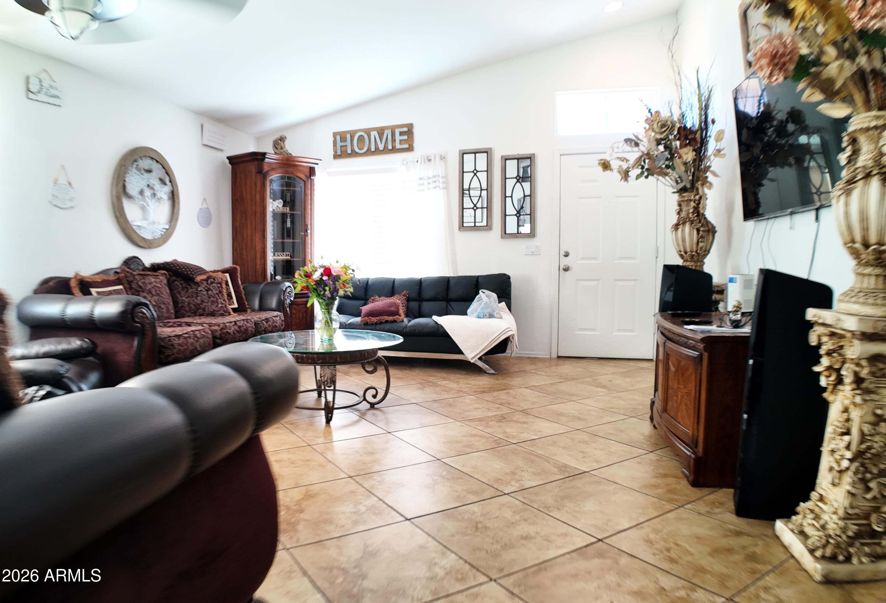 7766 W MYRTLE Avenue