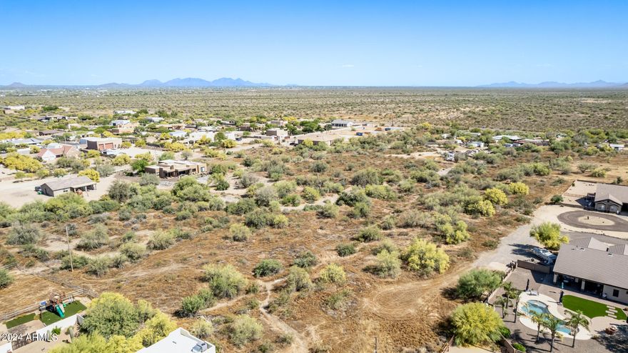 Largest lot in area with lots of space for privacy and horses. Great flat building site looking down into wash. Very close to Cave Creek Regional Park with horseback, hiking and biking trails. This property will make a great private estate. Mountain views to the North. Don't miss this unique opportunity in an area that is already built out!