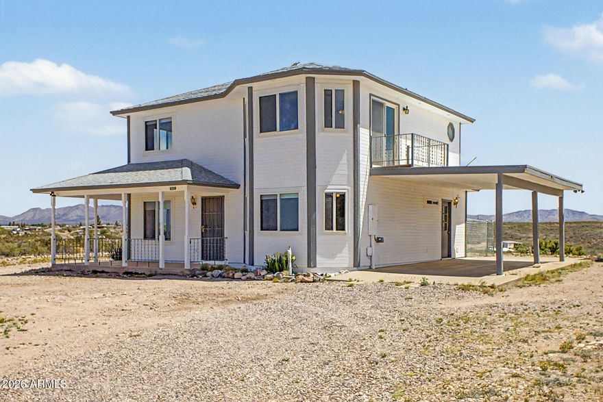 Perched on just over half an acre, this beautifully updated 3-bedroom, 2.5-bath home offers 1,687 square feet of comfortable living space paired with truly exceptional views - especially from the private second-story balcony that creates the perfect backdrop for morning coffee or evening relaxation.

Inside, the home has been thoughtfully refreshed with new interior and exterior paint, creating a clean, modern feel throughout. The main level features newer hardwood flooring, while the upstairs boasts newer carpet for added comfort. Upgraded windows enhance both energy efficiency and natural light.

The kitchen is equipped with a newer electric range and refrigerator, blending functionality with convenience for daily living and entertaining. Outside, the expansive lot provides ample space for parking, including an RV plug - ideal for those seeking flexibility and room to store recreational vehicles or accommodate guests.

Located less than a mile from Historic Allen Street, this property offers the perfect balance of peaceful, scenic living with easy access to local charm, dining, and entertainment.

A rare combination of space, updates, and views - this home is ready to impress.