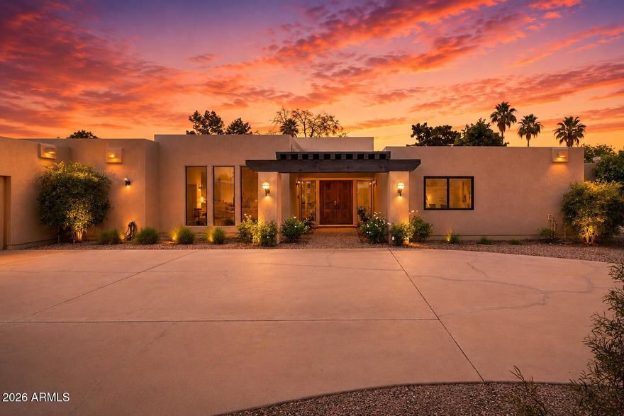 This modern home on the Wigwam Gold golf course has been fully remodeled and is loaded with timeless design elements. The split floor plan creates open spaces with tons of natural light, along with restored original beams, making this a rare find for golf course living.  It includes a gorgeous kitchen island with GE Monogram appliances, an oversized living room, private home office nook, and a fantastic primary suite with a tasteful bath. The exceptional finishes include hardwood throughout, custom cabinetry, marble and quartz, artistic tile accents, designer lighting, mirrors and finishes, and custom closet finishes.  The property features a spacious grassy yard, privacy tree lines, a large covered patio, and a courtyard with a gas fire pit taking advantage of the amazing mountain views.